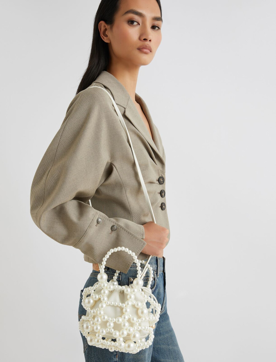 majhna torba z okroglim detajlom - biserno siva