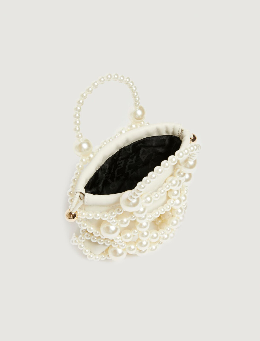 majhna torba z okroglim detajlom - biserno siva