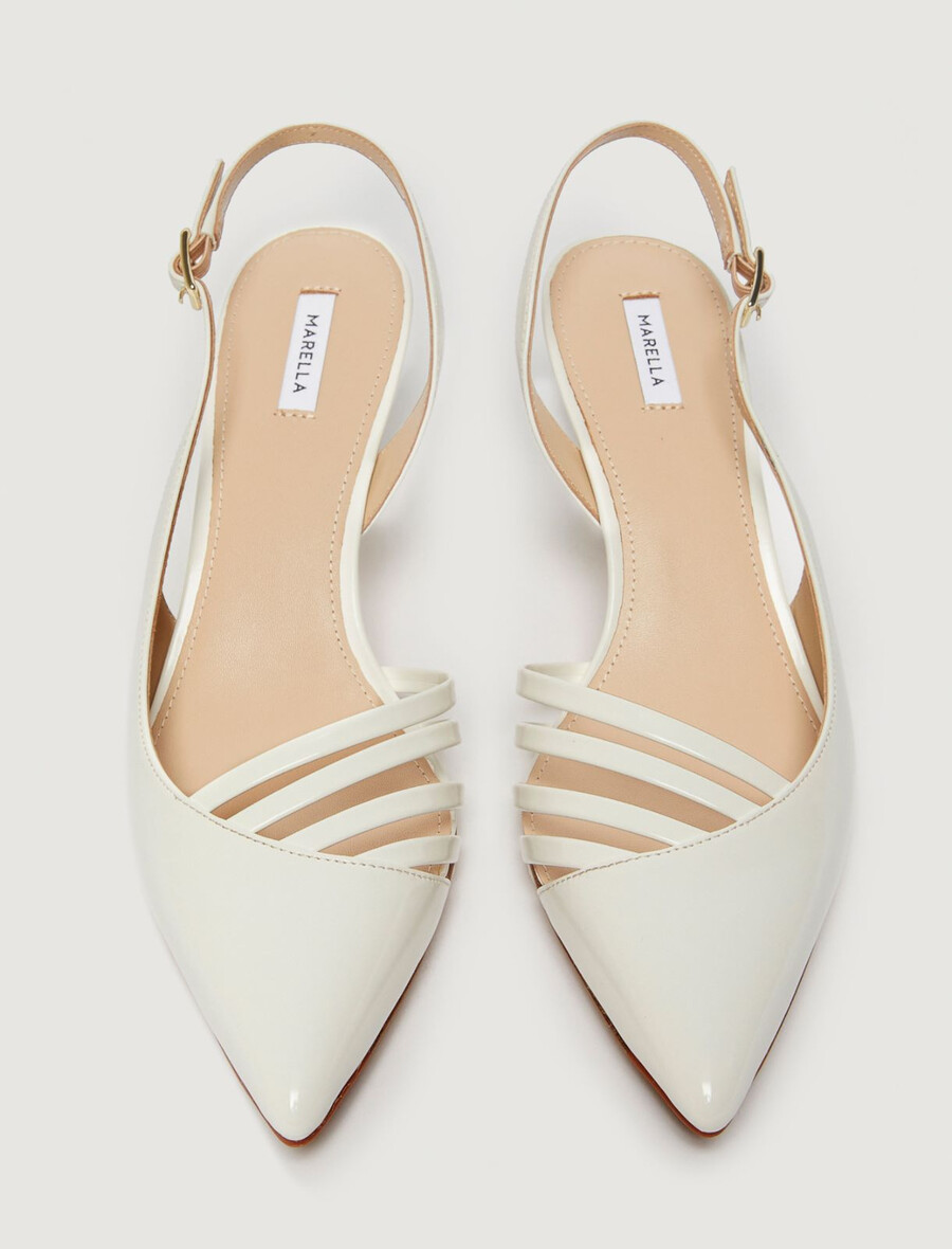 Čevlji z naramnicami - bela